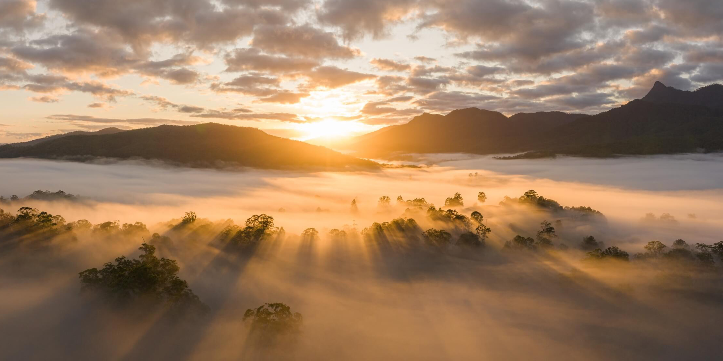 Sunrise over a misty mountain, taken with the DJI Mavic 3 Pro